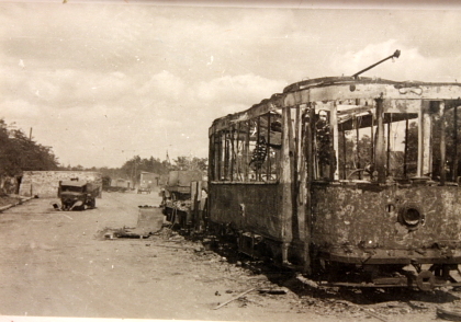Damaged street car, location and date unknown