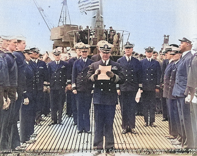Commander Joseph Willingham reading his orders to assume command of submarine USS Bowfin at her commissioning, 1 May 1943, Portsmouth Navy Yard, Portsmouth, New Hampshire, United States. [Colorized by WW2DB]