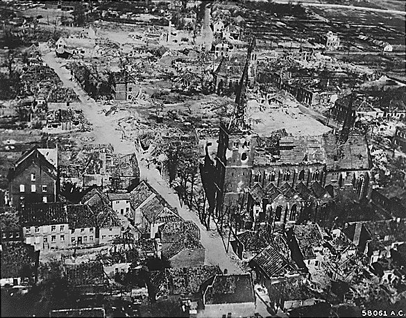 Aerial photograph of a damaged German town during Rhine River area fighting, 24 Mar 1945; taken by crew of B-24 Liberator bomber of 2nd Air Division, US 8th Air Force