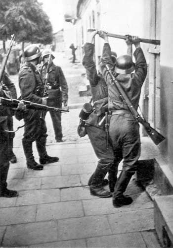 German troops forcing entry into a building, Western Poland, mid-Sep 1939