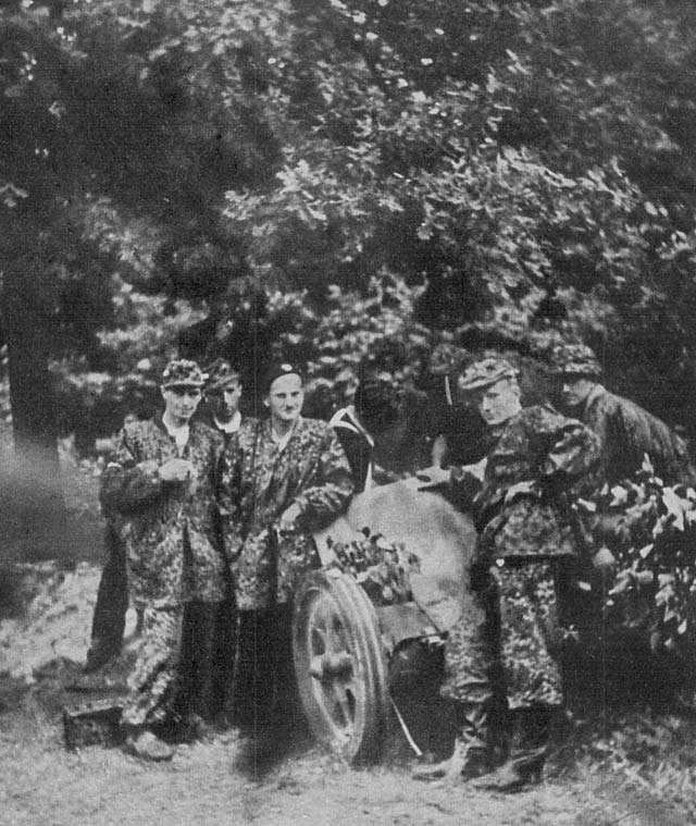 Polish resistance fighters posing with a captured German 5 cm PaK 38 field gun, Krasinskich Gardens, Warsaw, Poland, 11 Aug 1944