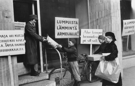 Finnish children collecting rags to warm soldiers on the front lines, Finland, 1939-1940