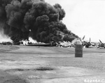 A B-29 Superfortress crashed during an attempted emergency landing on Iwo Jima Apr 24, 1945 and ran into nine P-51 Mustangs.
