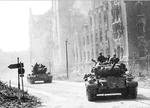 M26 Pershing tanks of the 2nd Armored Division on the streets of Magdeburg, Germany, mid Apr 1945