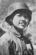 Portrait of one of the about 300 female conscripts from Guangdong Province, China, 1938; these young women underwent 3 months of military training as the Japanese advanced toward Guangdong
