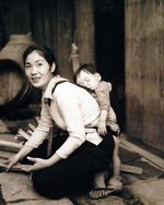 Mother and child, Sasebo, Japan, Sep 1945; photograph taken a crewman of USS Chenango