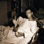 US Marine Corporal Leopold A. Kulikowski, former prisoner of war in Japan, aboard hospital ship USS Benevolence, Sep 1945