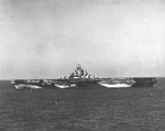 USS Randolph in Chesapeake Bay, Virginia, United States during her shakedown period, 12 Nov 1944. Note camouflage Measure 32 Design 17a. Photographed from escort carrier USS Charger.