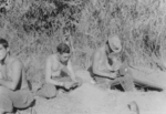 Men of US 5332nd Brigade (Provisional) decoding intercepted Japanese messages, Burma, 1945; Sindelar, Thompson, and Dennis Collins