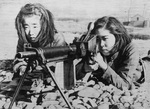 Female Japanese civilians training with a Type 11 machine gun, Ryukyu Islands, Japan, Jun 1945