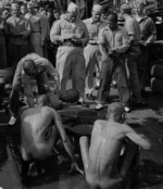 Public humiliation of Japanese prisoners of war aboard USS New Jersey, Dec 1944, photo 4 of 6