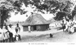 Postcard featuring a village along Cuva creek, Fiji, 1940s