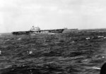 Yorktown-class aircraft carriers Hornet (near) and Enterprise (far) as seen from the cruiser USS Salt Lake City shortly after Hornet launched the Doolittle Raid against Japan, 18 Apr 1942.