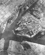 Aerial view of Nordseewerke Emden shipyard, Emden, Germany, 1942; note Slips I through V in center