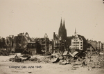 War damaged Köln (Cologne), Germany, Jun 1945; note Hohe Domkirche Sankt Petrus cathedral in background