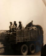 US Army personnel aboard a CCKW vehicle, Italy, 1945