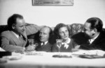 Film director Arnold Fanck, aviator Ernst Udet, actress Leni Riefenstahl, and actor Paul Kohner, 1932