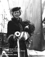 Sponsor Mrs. Florence Tryon, great-great-granddaughter of the ship’s namesake Samuel Nicholas, preparing to christen the Fletcher-class destroyer Nicholas at the Bath Iron Works, Bath, Maine, United States, 19 Feb 1942.
