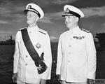 Fleet Admiral Chester Nimitz USN (left) and Admiral Sir Bruce Fraser RN aboard Fraser’s flagship, HMS Duke of York, at Guam as Fraser invested Nimitz as a Knight Grand Cross of the British Order of the Bath, 10 Aug 1945.