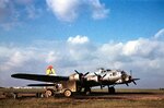 A B-17G Fortress of the 306th Bomb Group at RAF Thurleigh, Bedfordshire, England, late 1944 to 1945. The Triangle-H with yellow band tail markings identify the bomber as part of the 306th Bomb Group.