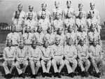 Non-commissioned officers of Headquarters Company, 422nd Infantry Battalion, 106th Infantry Division at Camp Atterbury, Indiana, 1944. Master Sergeant Roddie Edmonds is in the front row, second from left.