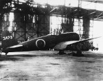 A7M2 Reppu fighter at rest in a hangar, Yokosuka, Japan, Sep 1945, photo 1 of 2