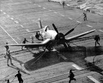 F4U-4 Corsair fighter of US Navy squadron VF-33 shortly after having landed on USS Leyte, 1952
