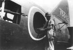 US serviceman taking a 20mm ammunition drum out of a G4M2a aircraft, Japan, 1945-1946