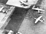 Horsa gliders on the ground near Arnhem, the Netherlands during Operation Market Garden, Sep 1944, photo 2 of 2; note tail sections removed for quick exit of troops and a jeep