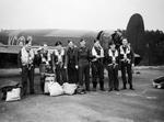 Wing Commander J. B. Tait (5th from left) with his crew in front of their Lancaster B Mk I (Special) bomber, RAF Woodhall Spa, Lincolnshire, England, United Kingdom, 13 Nov 1944