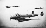 Pe-2 dive bombers in flight, date unknown, photo 1 of 2