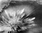 Bomb dropped by Japanese pilot Kazumi Horie exploding on the flight deck of USS Enterprise during Battle of the Eastern Solomons, 24 Aug 1942
