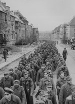 German prisoners marching along Joseph-von-Görres-Straße, Aachen, Germany, circa late Oct 1944
