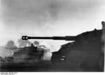 German Panzer VI/Tiger I tanks passing burning buildings during the Battle of Kursk in Orel (Oryol), Russia, mid-Jul 1943