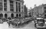 Japanese troops marching through Fullerton Square, Singapore, circa Feb 1942