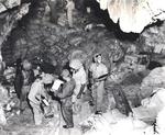 US Marines checking supplies of food and ammunition in a cave on Saipan, Mariana Islands, 1944