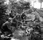 Vickers machine guns of 2nd Middlesex Regiment, British 3rd Division firing in support of troops crossing the Meuse-Escaut (Maas-Schelde) Canal at Lille-St. Hubert, Belgium, 20 Sep 1944
