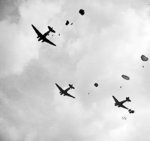 C-47 Dakota aircraft dropping troops of UK 1st Airborne Division over Oosterbeek near Arnhem, the Netherlands, 17 Sep 1944