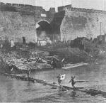 Japanese soldiers crossing the Qinhuai River near the Nanjing city wall, China, 13 Dec 1937