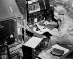 US Army radioman Corporal John Robbins operating his SCR 188, Dobodura, New Guinea, 9 May 1943
