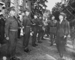 British Prime Minister Clement Attlee, accompanied by Brigadier O. M. Wales, inspecting the honor guard of British Scots Guards regiment during the Potsdam Conference, Germany, 28 Jul 1945