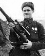Russian soldier Vasily Zaytsev posing with his Mosin-Nagant sniper rifle, Stalingrad, Russia, Oct 1942