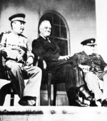 Joseph Stalin, Franklin Roosevelt, and Winston Churchill on the portico of the Soviet Embassy during the Tehran Conference, Iran, 29 Nov 1943, photo 2 of 2