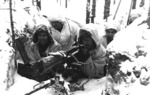 Finnish Army machine gun crew near Lemetti, Karjala, Finland (now Pitkyarantsky, Russia), 21 Feb 1940; note Maxim M32/33 machine gun