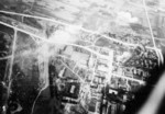 Heito Airfield under attack by aircraft of squadron VB-80 from USS Ticonderoga, southern Taiwan, 9 Jan 1945, photo 1 of 3