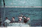German officers observing the firing of 8.8cm guns from a gunboat on the Black Sea off Constanta, Romania, Jul 1941