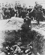 The execution of an Ukrainian Jew by man of German Einsatzgruppe C or Einsatzgruppe D, Vinnytsia, Ukraine, circa mid-1941