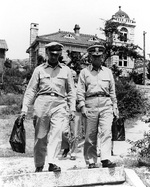 Major General Henry I. Hodes and Rear Admiral Arleigh A. Burke leaving the 