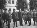 Ferdinand Catlos, Augustín Malár, and others at the market square outside the town hall of Sanok, Poland, circa late Sep 1939