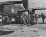 Claire Chennault with Chinese officers at an airfield, Kunming, Yunnan Province, China, 1942-1943; note B-25 bomber